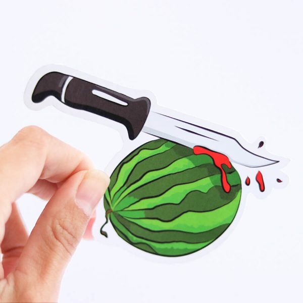 Watermelon Slasher Sticker | Holding with fingers | Ash Robertson Design | Sinful Summer