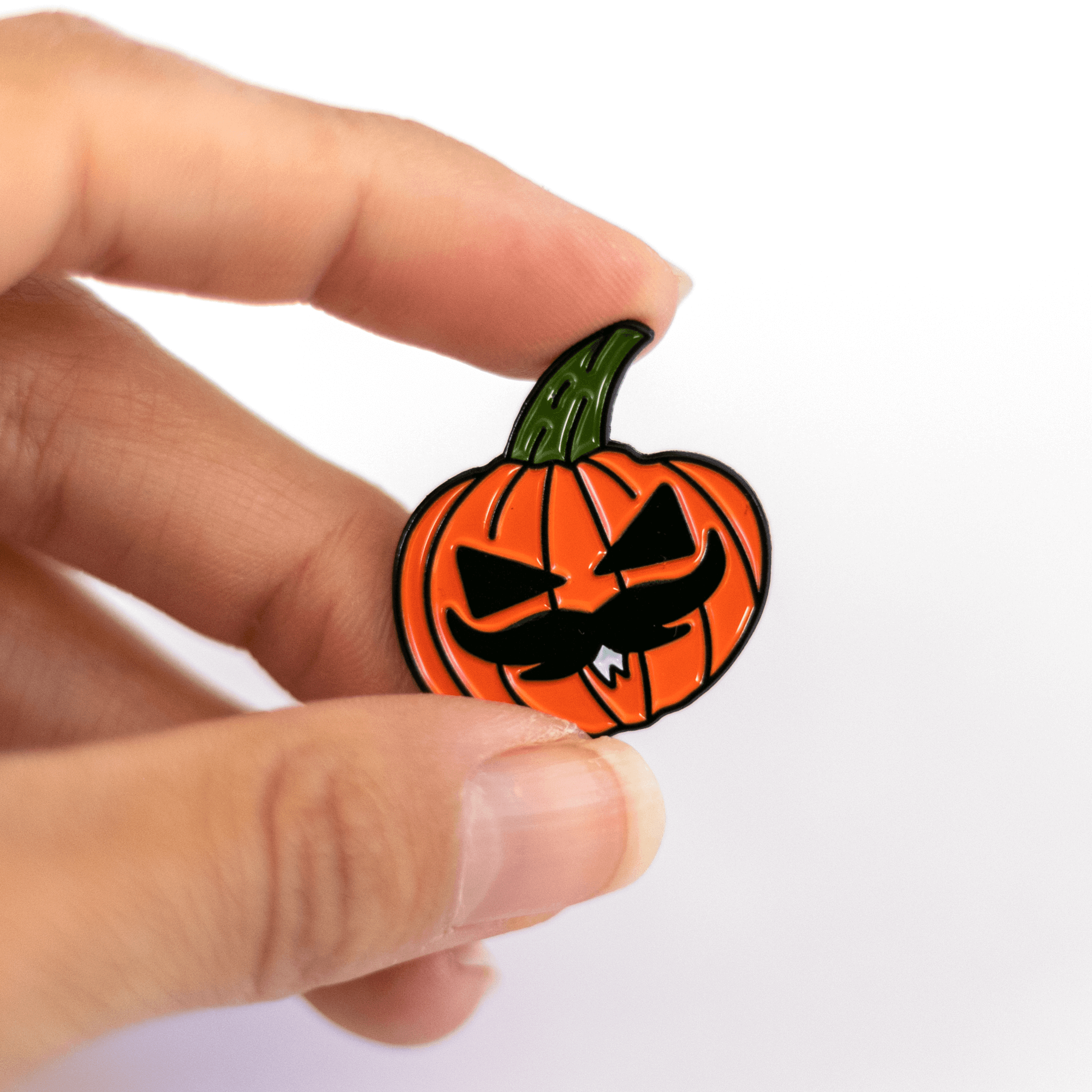 Holding Pumpkin Moustache Man (Soft Enamel Pin) - Front Facing