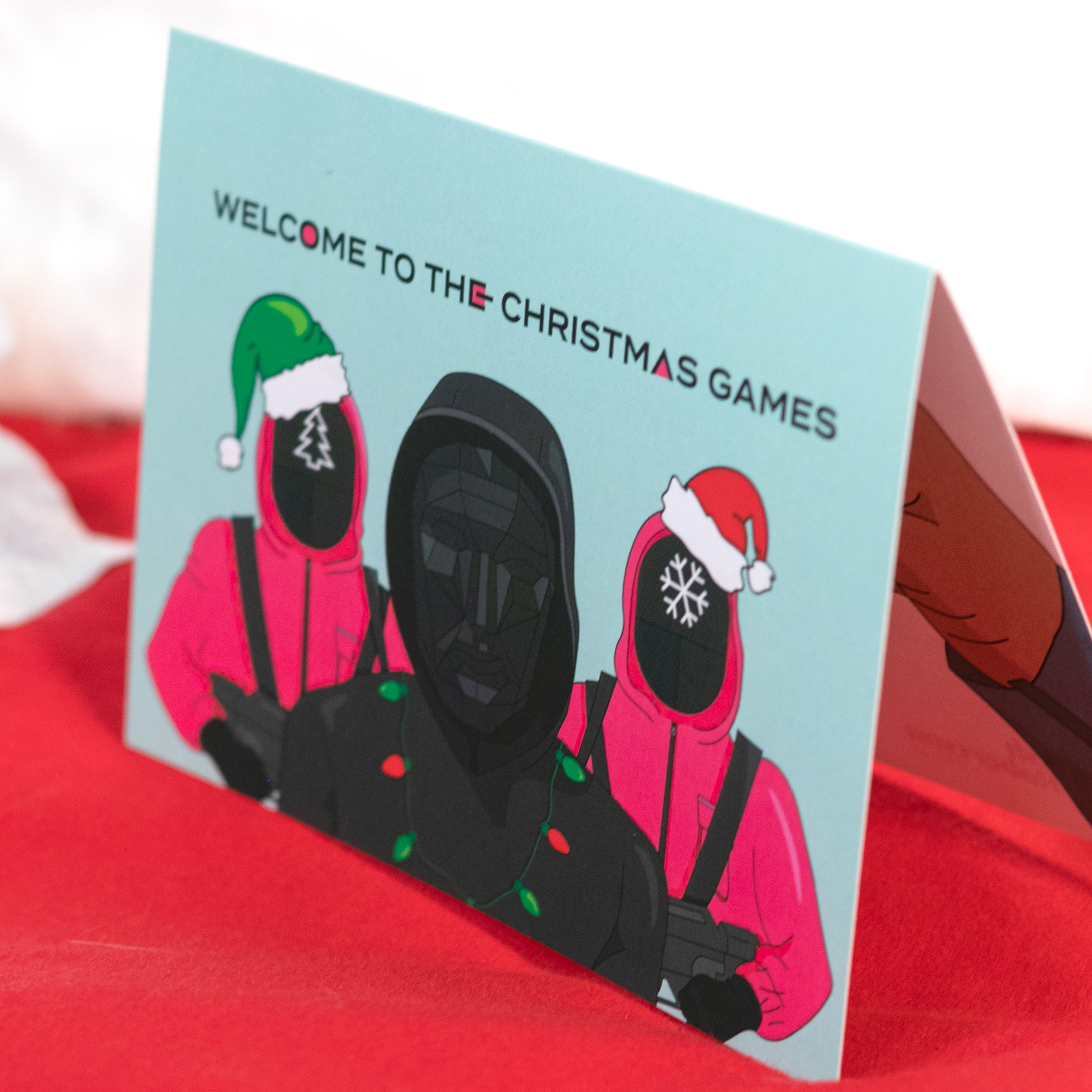 Welcome to the Christmas Games (Greeting Card) | Squid Game Parody | Ash Robertson Design | Side Angle